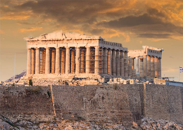 acropolis The Acropolis on a limestone hill in Athens, Greece with dark clouds overhead.
